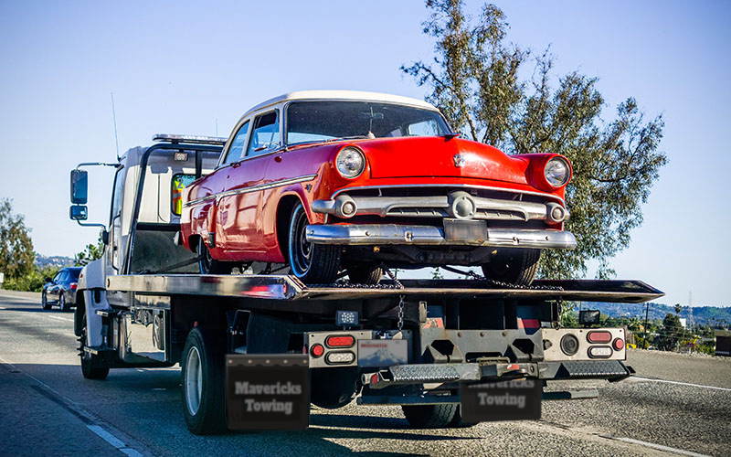 mavericks-transporting-classic-car